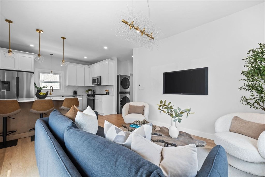 Dining room, Interior, Kitchen, Living room, Pendant Lights, Recessed Lighting, Stainless Steel Appliances, Wood Texture Flooring