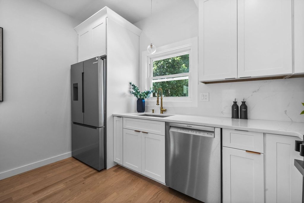 Interior, Kitchen, Marble Walls, Stainless Steel Appliances, Wood Texture Flooring