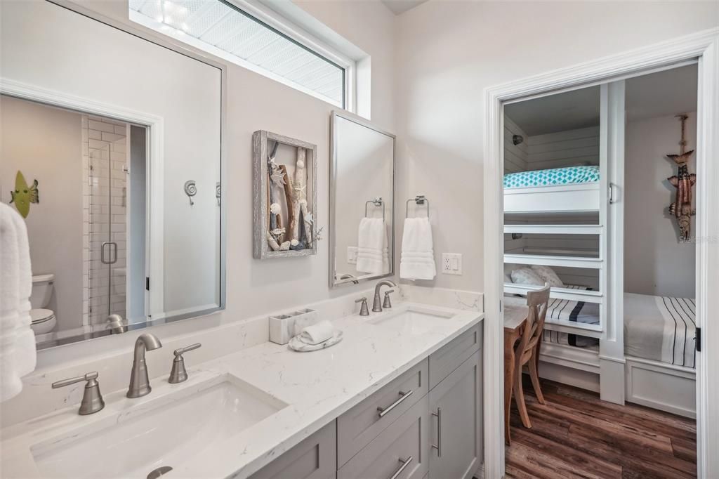 Bathroom, Dual Sink Vanities, Glass Shower, Interior, Wood Texture Flooring