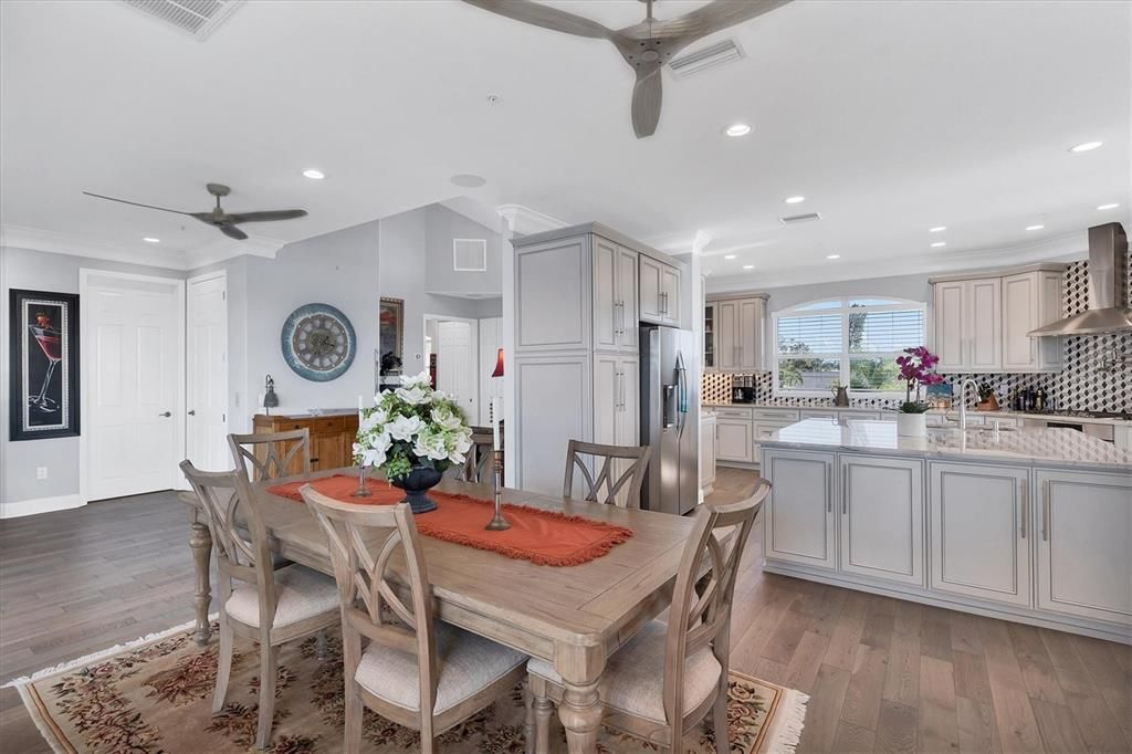 Dining room, Interior, Kitchen, Recessed Lighting, Stainless Steel Appliances, Wood Texture Flooring