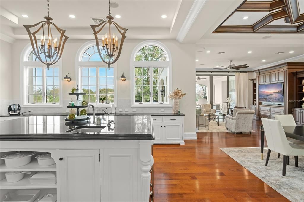 Chandelier, Dining room, Interior, Kitchen, Living room, Pendant Lights, Recessed Lighting, Wood Texture Flooring