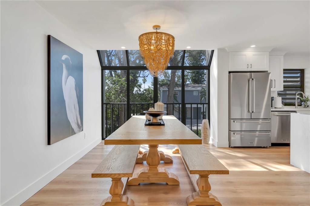 Chandelier, Dining room, Interior, Kitchen, Recessed Lighting, Stainless Steel Appliances, Wood Texture Flooring