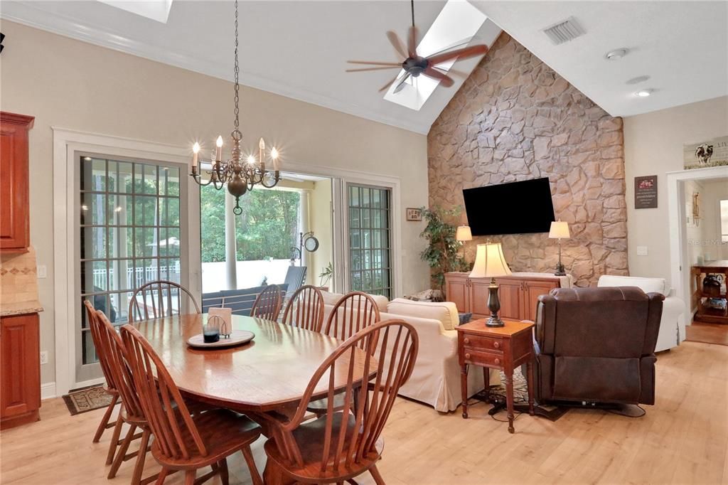 Chandelier, Dining room, Interior, Living room, Stone Walls, Wood Texture Flooring