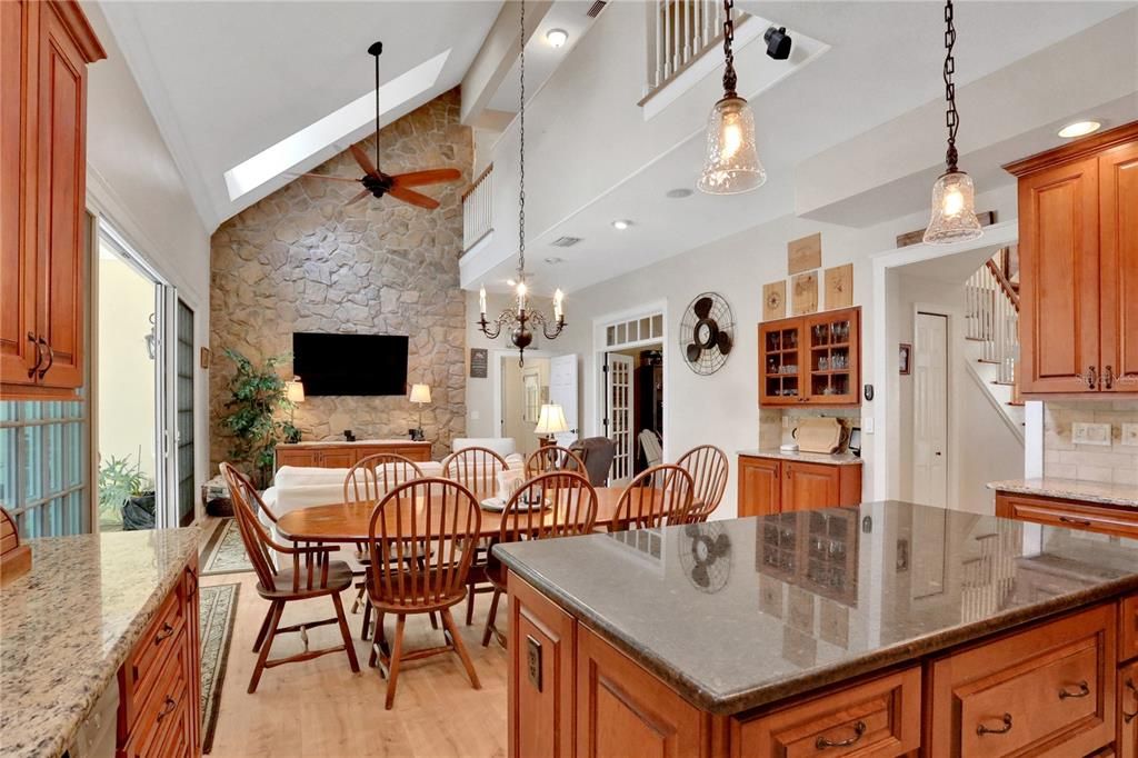 Chandelier, Dining room, Interior, Kitchen, Pendant Lights, Recessed Lighting, Stone Walls, Wood Texture Flooring