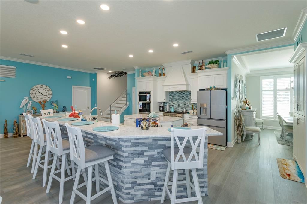 Dining room, Interior, Kitchen, Recessed Lighting, Stainless Steel Appliances, Wood Texture Flooring