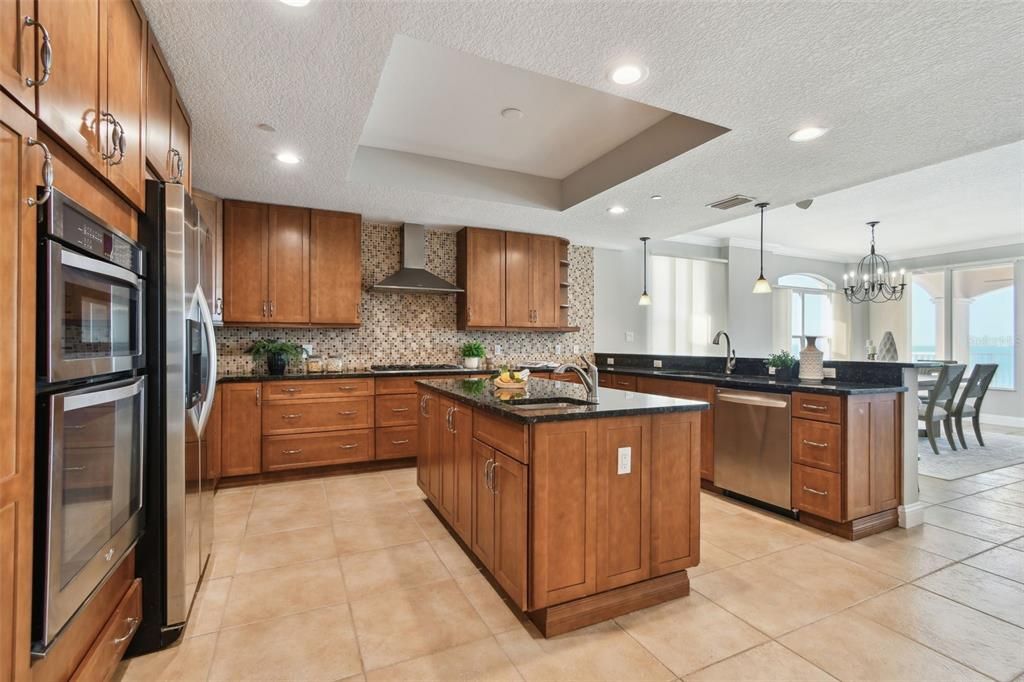 Chandelier, Dining room, Interior, Kitchen, Pendant Lights, Recessed Lighting, Stainless Steel Appliances