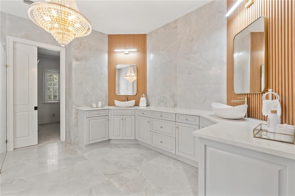 Bathroom, Chandelier, Dual Sink Vanities, Interior, Marble, Marble Walls
