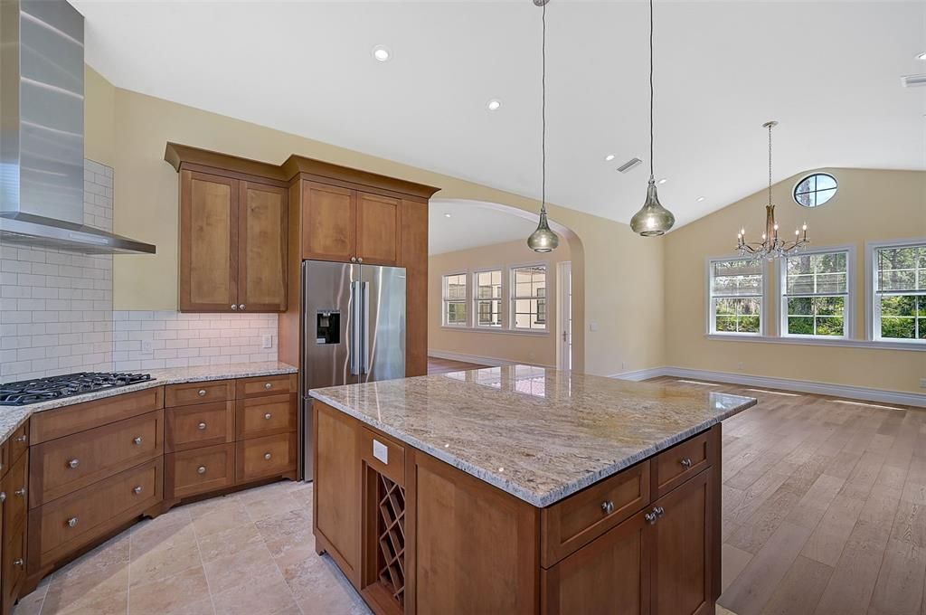 Chandelier, Interior, Kitchen, Pendant Lights, Recessed Lighting, Stainless Steel Appliances, Wood Texture Flooring