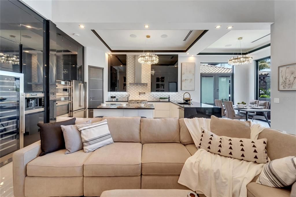 Chandelier, Dining room, Interior, Kitchen, Living room, Pendant Lights, Recessed Lighting, Stainless Steel Appliances