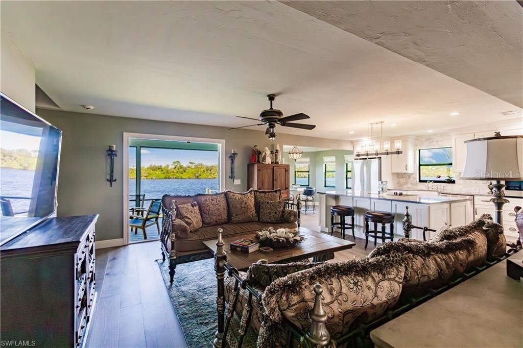 Chandelier, Interior, Kitchen, Living room, Recessed Lighting, Water, Wood Texture Flooring