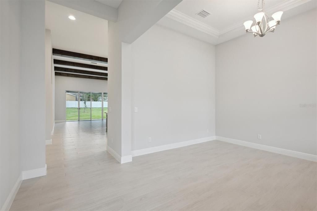 Chandelier, Empty room, Interior, Recessed Lighting, Wooden Beams, Wood Texture Flooring