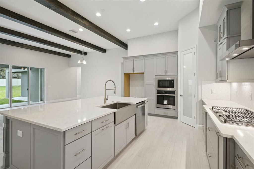 Interior, Kitchen, Pendant Lights, Recessed Lighting, Stainless Steel Appliances, Wooden Beams, Wood Texture Flooring