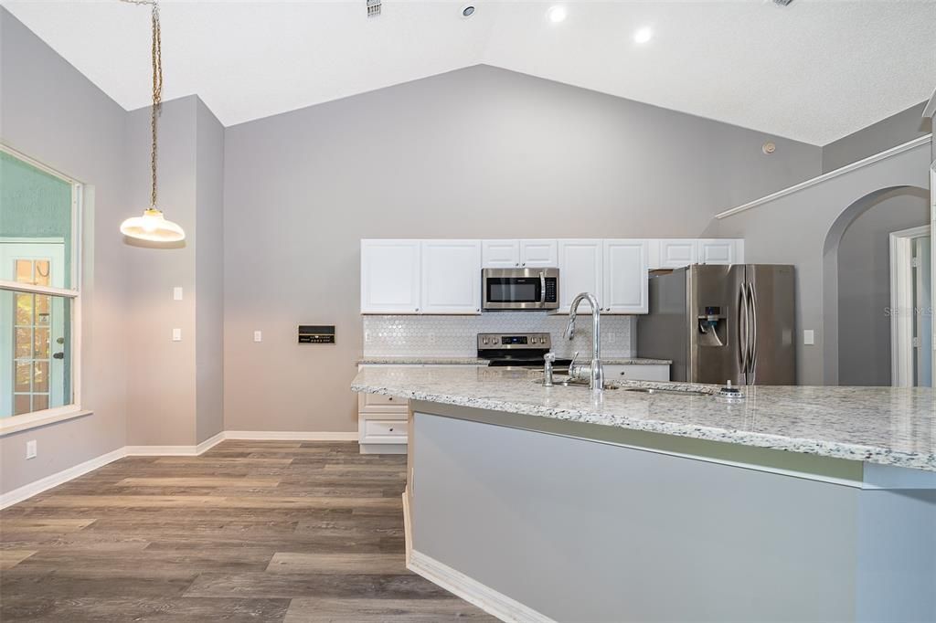 Interior, Kitchen, Pendant Lights, Recessed Lighting, Stainless Steel Appliances, Wood Texture Flooring