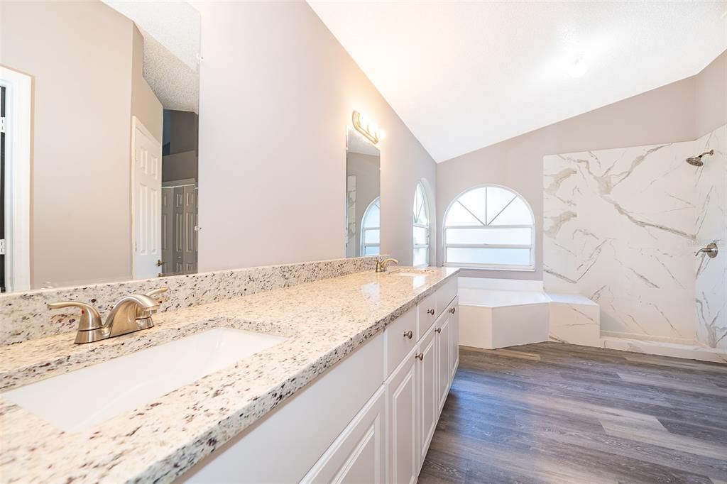 Bathroom, Dual Sink Vanities, Interior, Marble Walls, Wood Texture Flooring