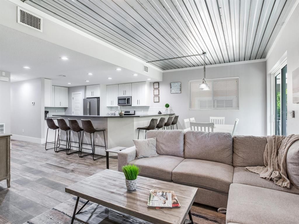 Dining room, Interior, Kitchen, Living room, Pendant Lights, Recessed Lighting, Stainless Steel Appliances, Wood Texture Flooring