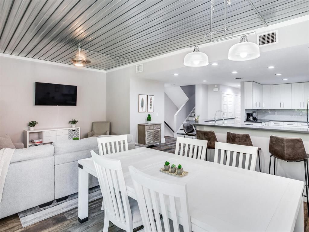 Dining room, Interior, Kitchen, Living room, Pendant Lights, Recessed Lighting, Stainless Steel Appliances, Wood Texture Flooring