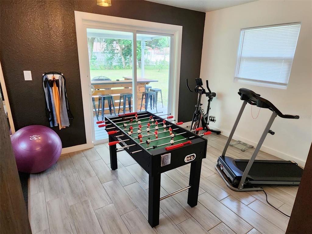 Fitness Equipment, Game Room, Interior, Wood Texture Flooring