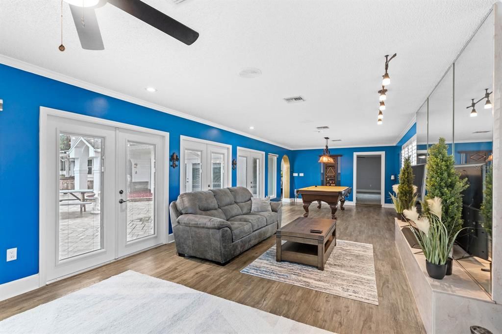 Billiard Table, Game Room, Interior, Living room, Pendant Lights, Recessed Lighting, Wood Texture Flooring