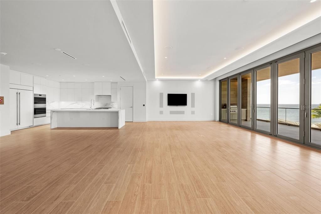 Interior, Kitchen, Marble Walls, Recessed Lighting, Stainless Steel Appliances, Water, Wood Texture Flooring