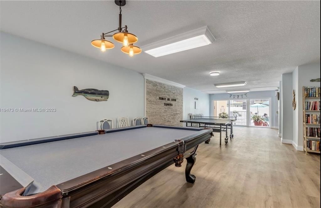 Billiard Table, Game Room, Interior, Pendant Lights, Stone Walls, Wood Texture Flooring