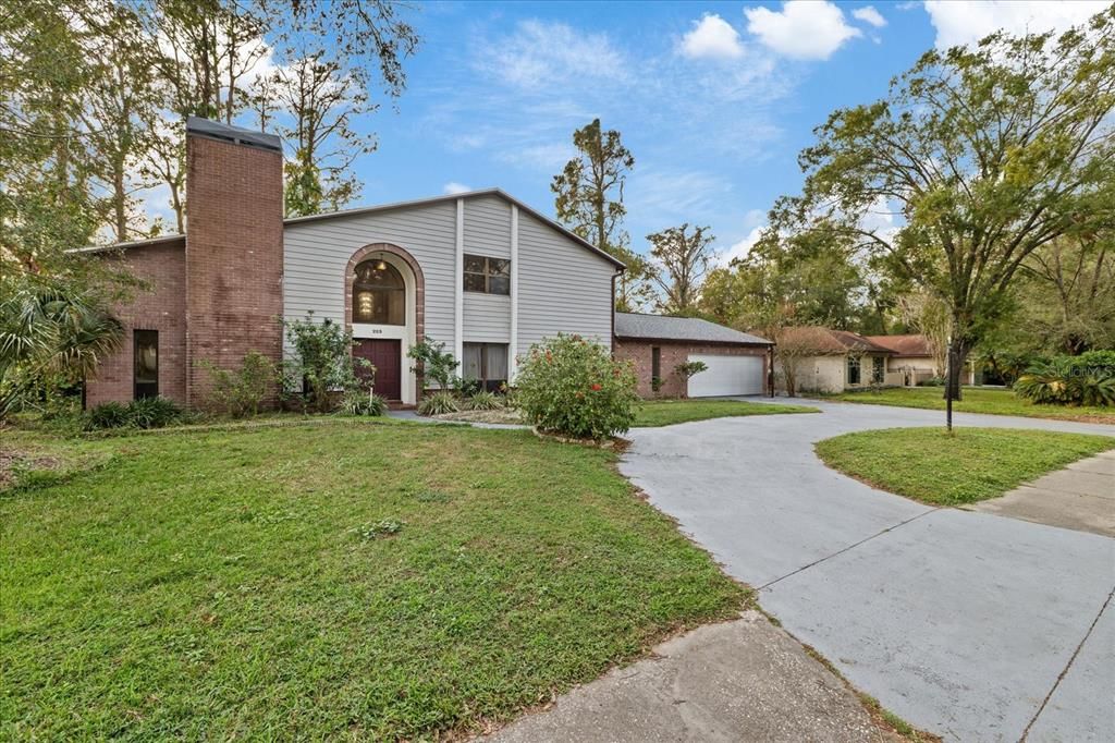 Attached, Backyard, Exterior, Facade, Brick Facade, None