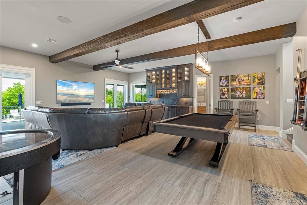Billiard Table, Game Room, Interior, Living room, Pendant Lights, Recessed Lighting, Wooden Beams, Wood Texture Flooring