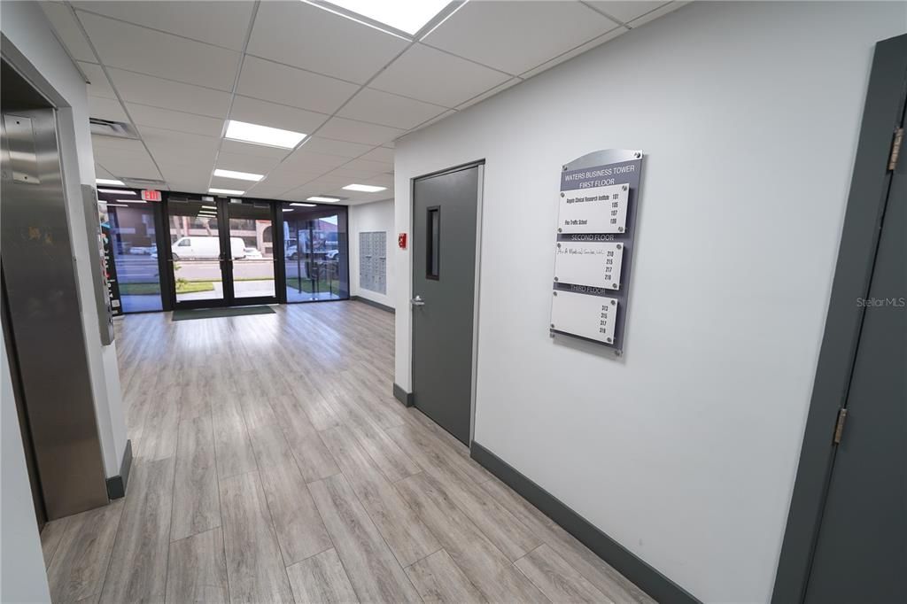 Elevator, Interior, Recessed Lighting, Wood Texture Flooring