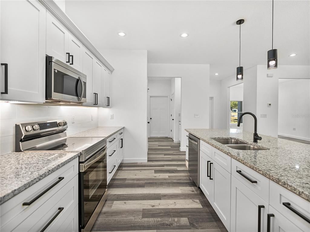 Interior, Kitchen, Pendant Lights, Recessed Lighting, Stainless Steel Appliances, Wood Texture Flooring