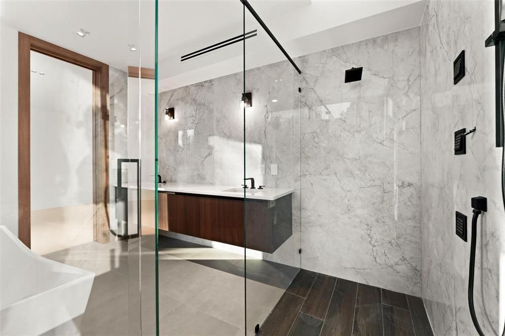 Bathroom, Glass Shower, Interior, Marble Walls, Recessed Lighting, Wood Texture Flooring