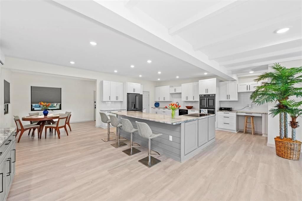 Dining room, Interior, Kitchen, Recessed Lighting, Stainless Steel Appliances, Wood Texture Flooring