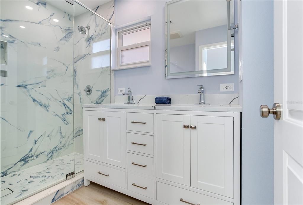 Bathroom, Glass Shower, Interior, Marble Walls, Recessed Lighting, Wood Texture Flooring