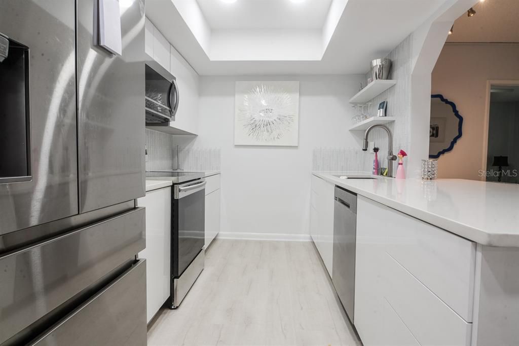Interior, Kitchen, Recessed Lighting, Stainless Steel Appliances, Wood Texture Flooring