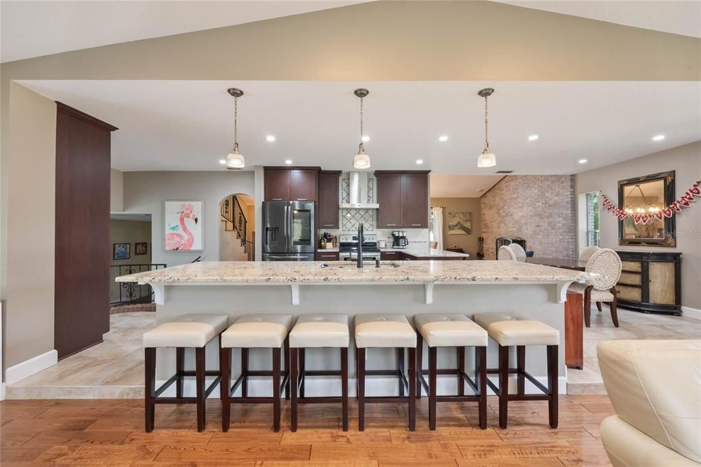 Interior, Kitchen, Pendant Lights, Recessed Lighting, Stainless Steel Appliances, Stone Walls, Wood Texture Flooring