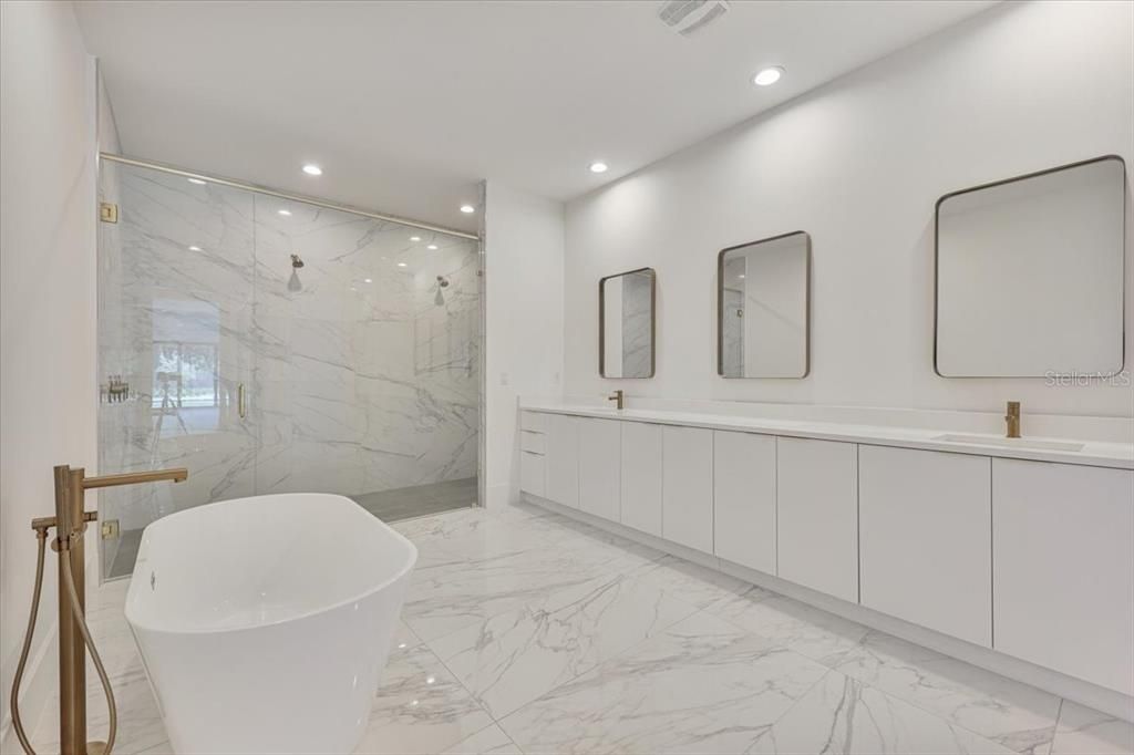 Bathroom, Dual Sink Vanities, Free Standing Baths, Interior, Marble, Marble Walls, Recessed Lighting