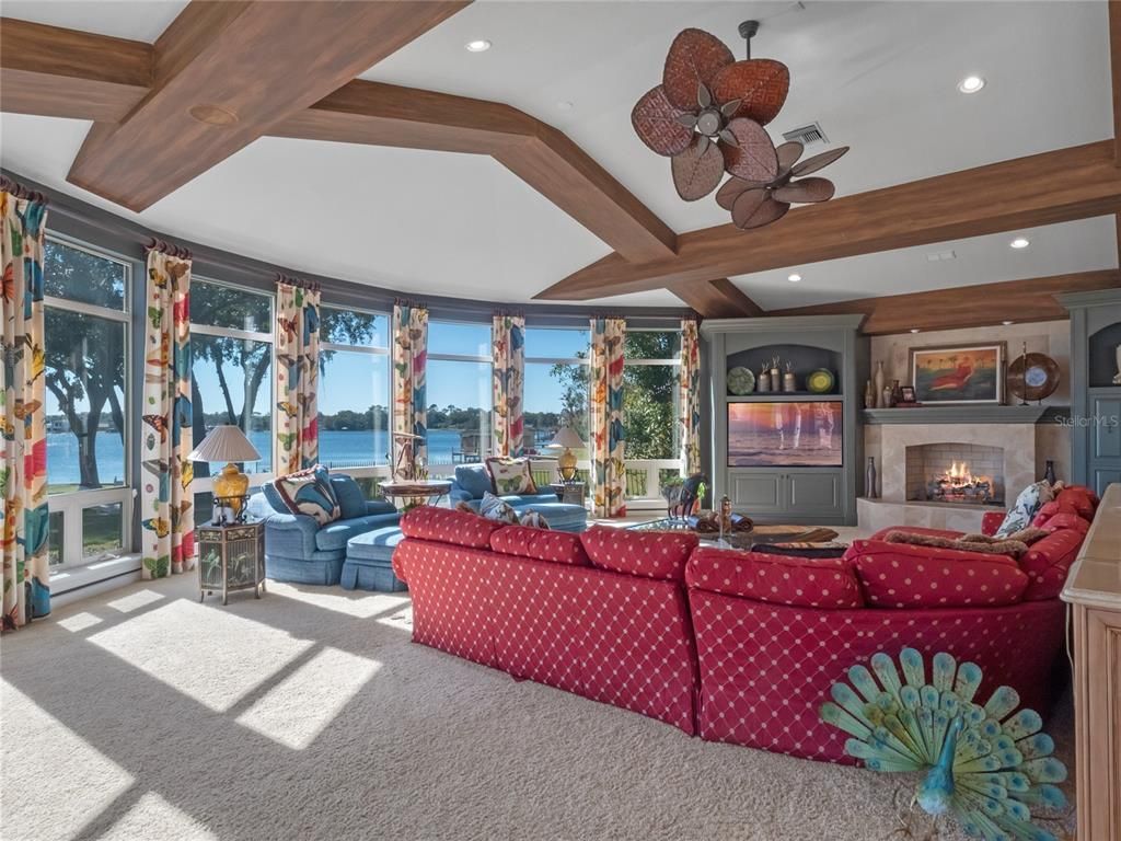 Fireplace, Interior, Living room, Recessed Lighting, Water, Wooden Beams