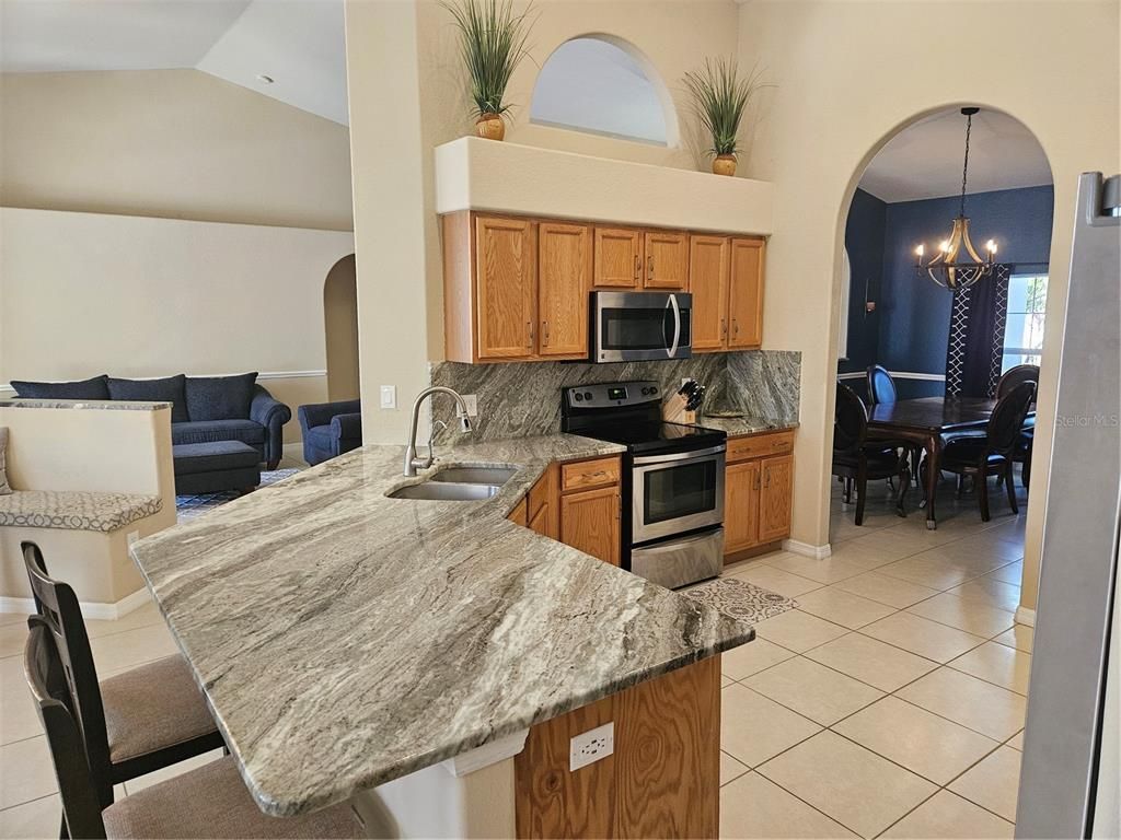 Chandelier, Dining room, Interior, Kitchen, Stainless Steel Appliances