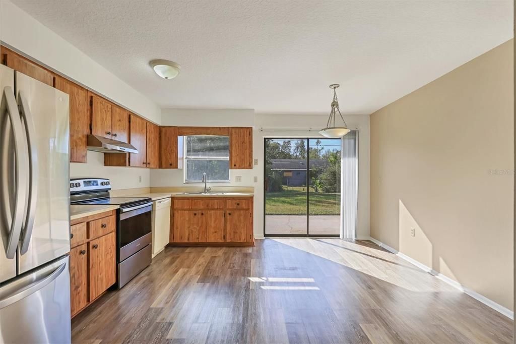 Interior, Kitchen, Pendant Lights, Stainless Steel Appliances, Wood Texture Flooring