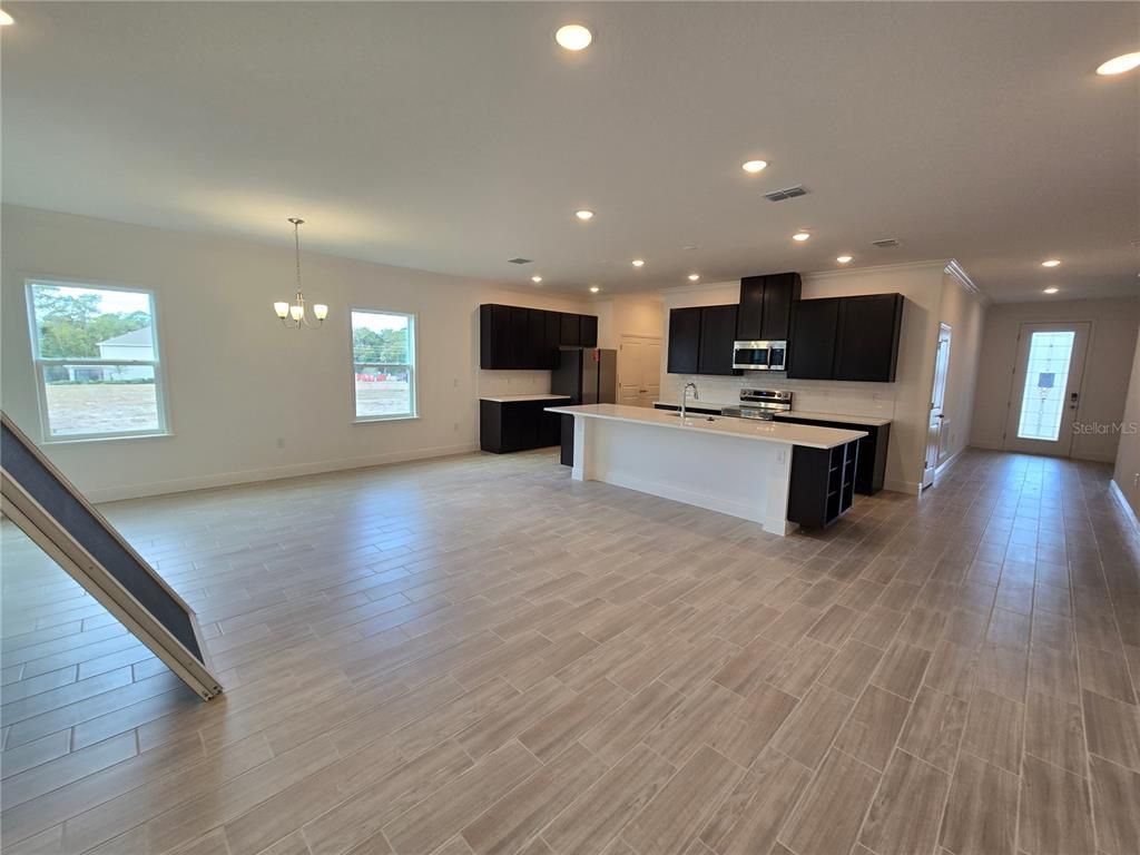 Chandelier, Empty room, Interior, Kitchen, Pendant Lights, Recessed Lighting, Wood Texture Flooring