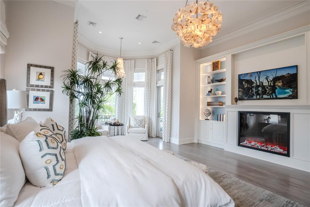 Bedroom, Chandelier, Fireplace, Interior, Pendant Lights, Recessed Lighting, Wood Texture Flooring