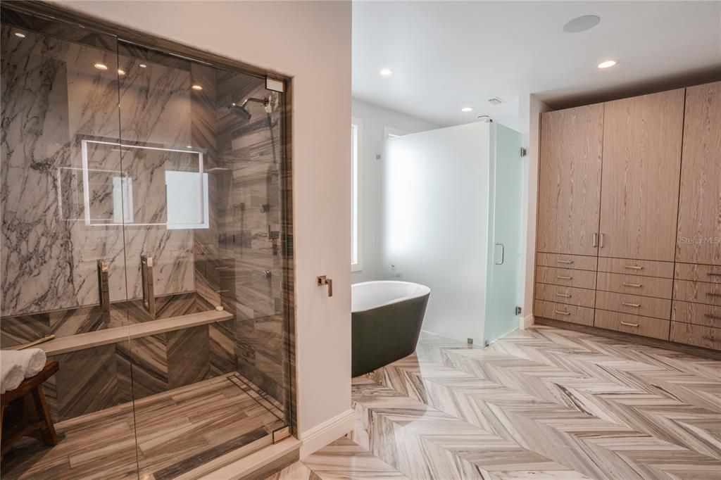 Bathroom, Free Standing Baths, Glass Shower, Interior, Marble Walls, Recessed Lighting