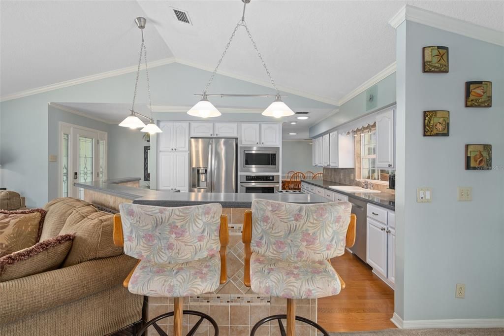 Interior, Kitchen, Pendant Lights, Recessed Lighting, Stainless Steel Appliances, Wood Texture Flooring
