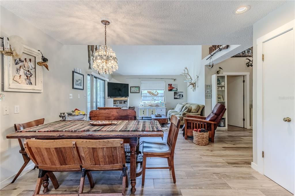 Chandelier, Dining room, Interior, Living room, Recessed Lighting, Wood Texture Flooring
