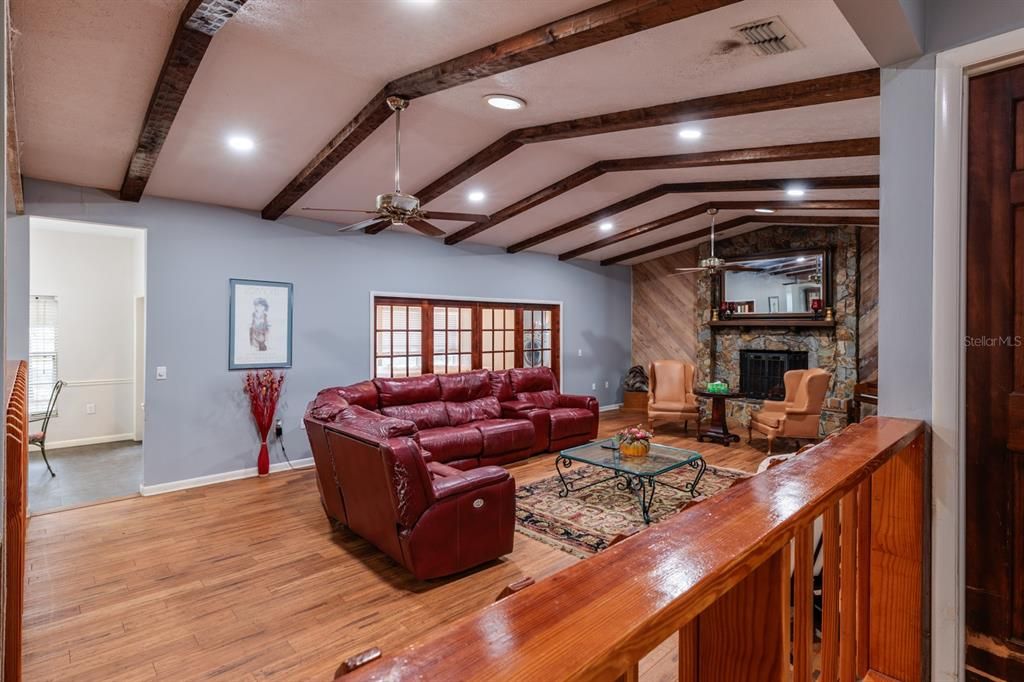 Fireplace, Interior, Living room, Recessed Lighting, Stone Walls, Wooden Beams, Wood Texture Flooring