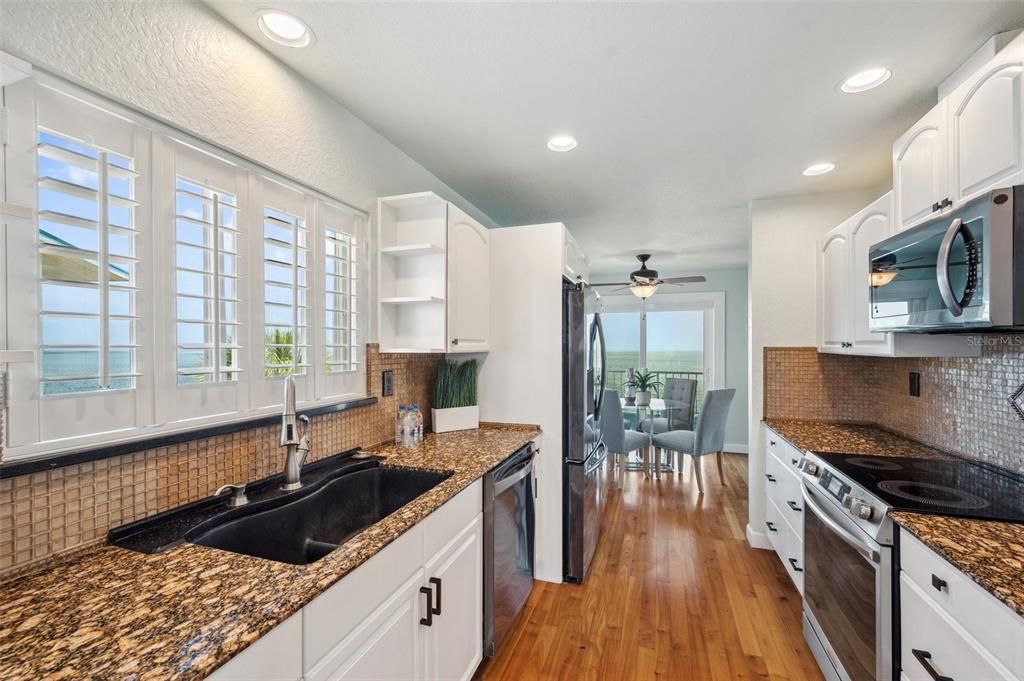 Dining room, Interior, Kitchen, Recessed Lighting, Water, Wood Texture Flooring
