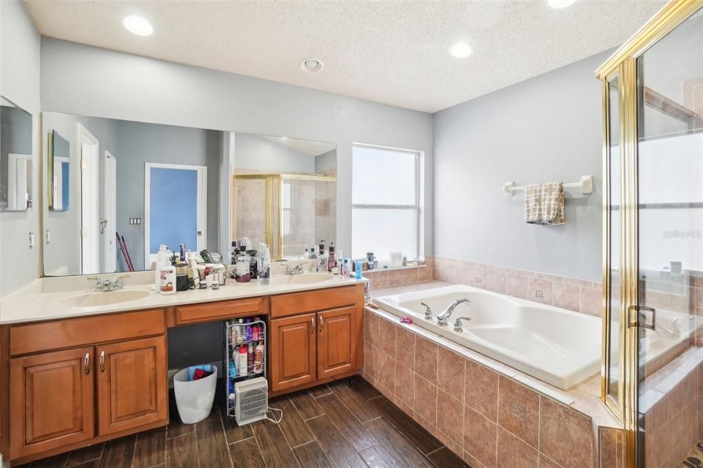 Bathroom, Dual Sink Vanities, Glass Shower, Interior, Recessed Lighting, Wood Texture Flooring