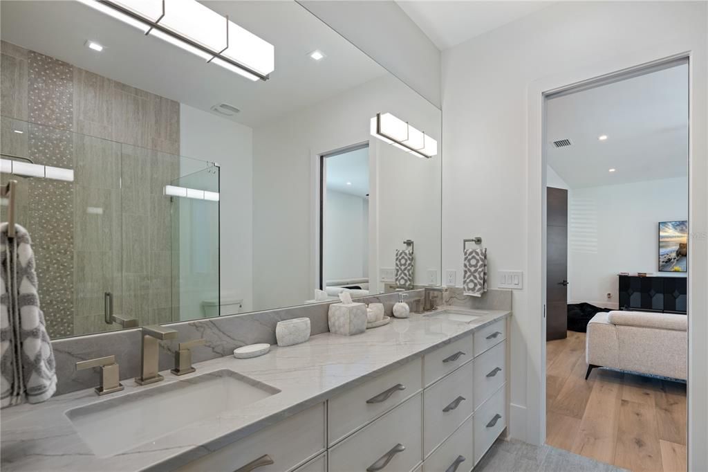 Bathroom, Dual Sink Vanities, Glass Shower, Interior, Recessed Lighting, Wood Texture Flooring