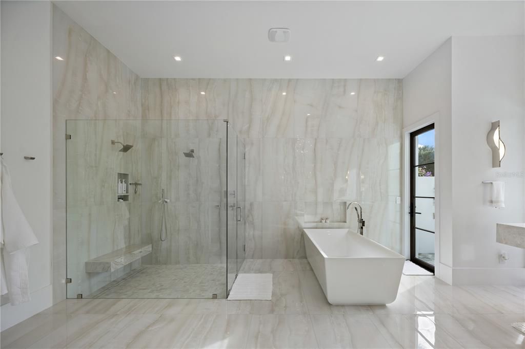Bathroom, Free Standing Baths, Glass Shower, Interior, Marble, Marble Walls, Recessed Lighting