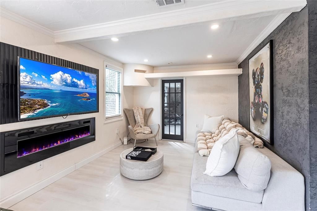 Fireplace, Interior, Living room, Recessed Lighting, Water, Wood Texture Flooring