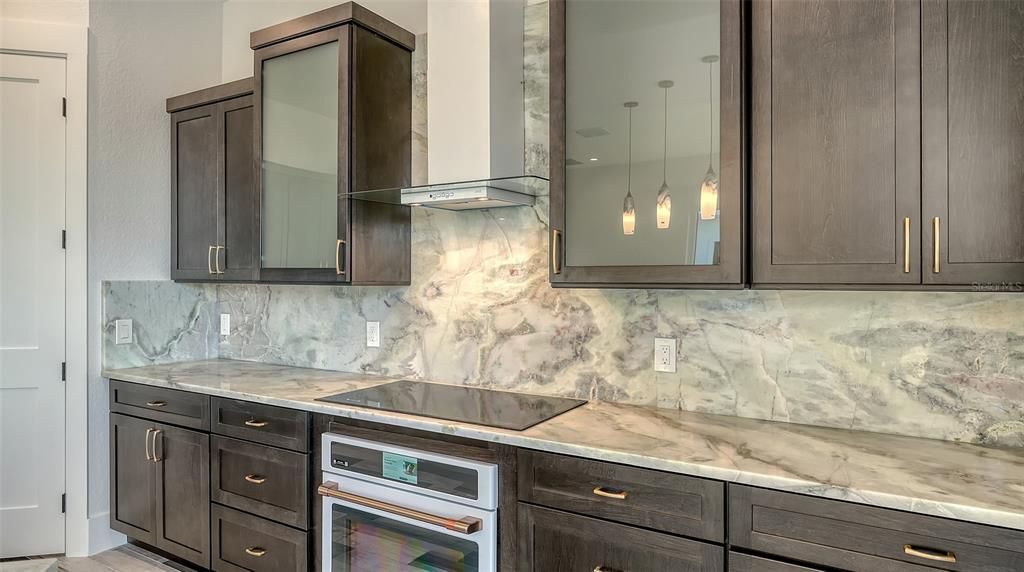 Interior, Kitchen, Marble Walls, Pendant Lights, Stainless Steel Appliances
