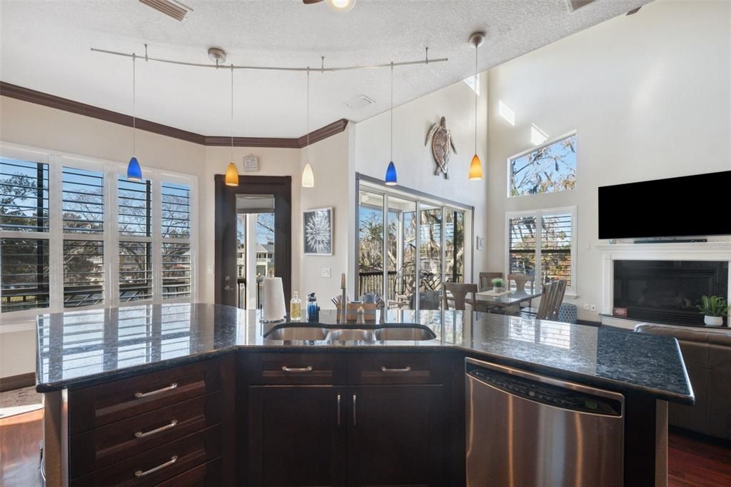 Dining room, Fireplace, Interior, Kitchen, Pendant Lights, Recessed Lighting, Wood Texture Flooring